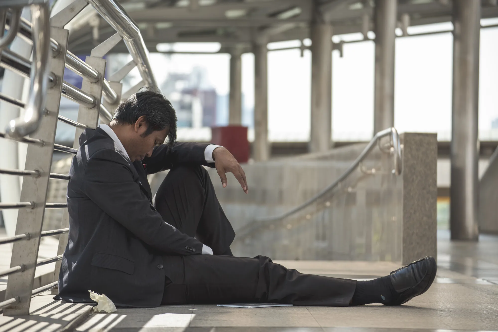 Woman in a quiet, reflective moment, taking a pause in natural light